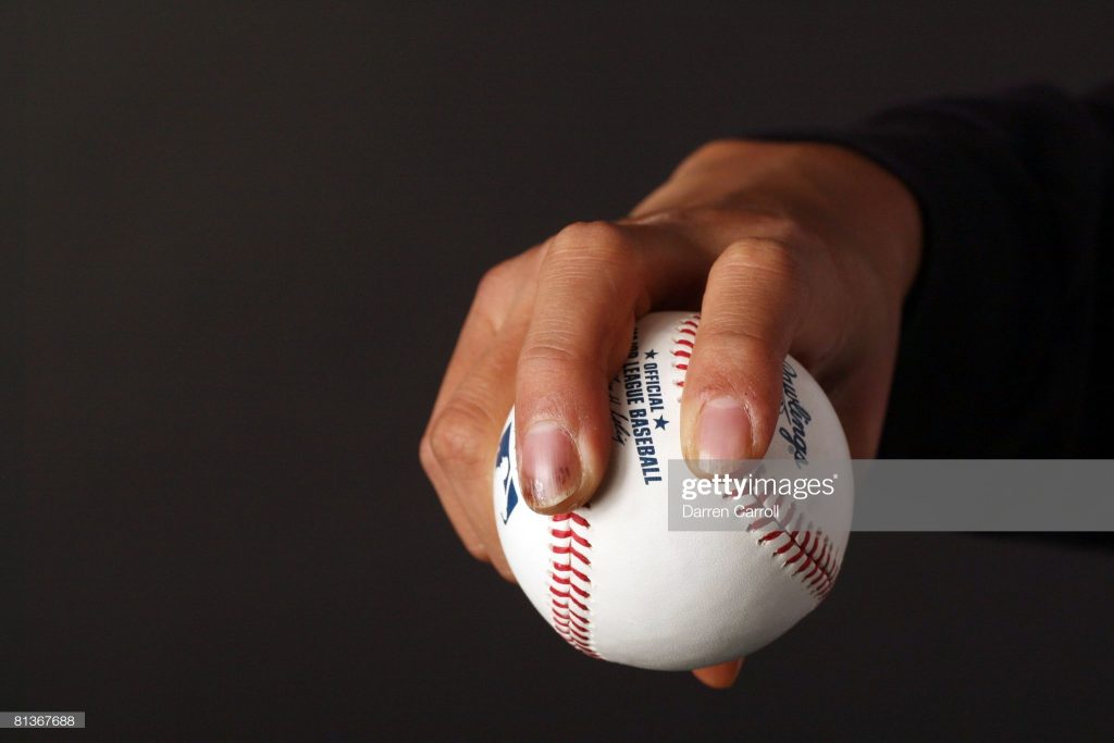 UNITED STATES - APRIL 09: Baseball: Closeup of hand of New York Yankees pitcher Chien-Ming Wang (40) demonstrating sinker grip on ball, equipment at Kauffman Stadium, Kansas City, MO 4/9/2008 (Photo by Darren Carroll/Sports Illustrated via Getty Images) (SetNumber: X80093 TK1 R1 F1)