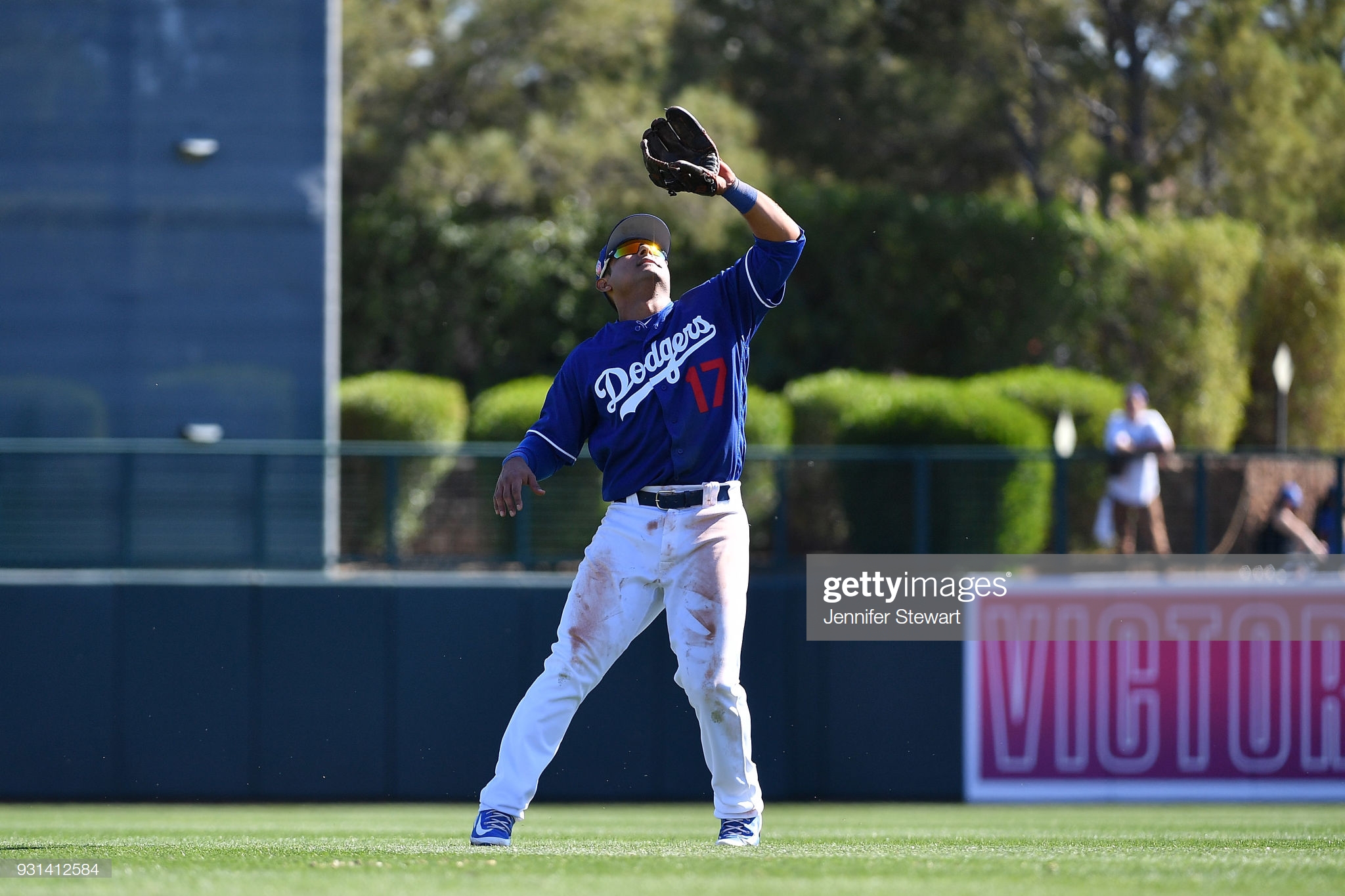 GLENDALE, AZ - MARCH 03: Donovan Solano #17 of the Los Angeles Dodgers catches a fly ball in a spring-training game against the Arizona Diamondbacks at Camelback Ranch on March 3, 2018 in Glendale, Arizona. (Photo by Jennifer Stewart/Getty Images)