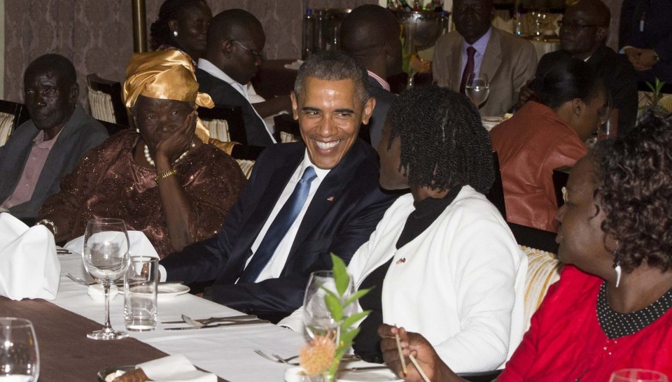 Obama sits alongside his step-grandmother, Mama Sarah and half-sister Auma during a family gathering at his hotel in Nairobi. Photograph: Saul Loeb/AFP/Getty Images