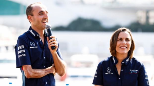 El piloto Robert Kubika y Claire Williams, directora de la escudería Williams.