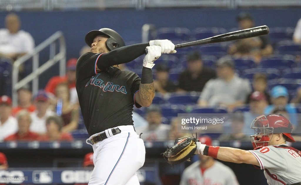 The Miami Marlins' Miguel Harold Ramirez hits a single in the first inning against the Philadelphia Phillies at Marlins Park in Miami on Saturday, June 29, 2019. (Pedro Portal/Miami Herald/TNS via Getty Images)
