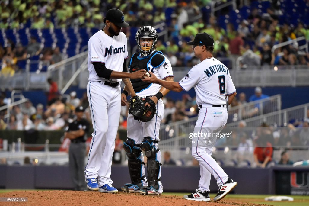 MIAMI, FL - JULY 18: Don Mattingly #8 of the Miami Marlins takes the baseball from Tayron Guerrero #56 during a pitching change in the sixth inning against the San Diego Padres at Marlins Park on July 18, 2019 in Miami, Florida. (Photo by Eric Espada/Getty Images)