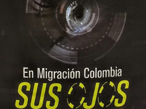 Foto de un cartel de Migración Colombia: Sus ojos hablan por usted