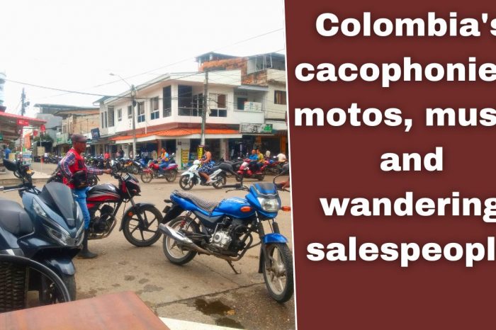 Photo shows a street with many motorbikes in the town of Puerto Asís, Colombia.