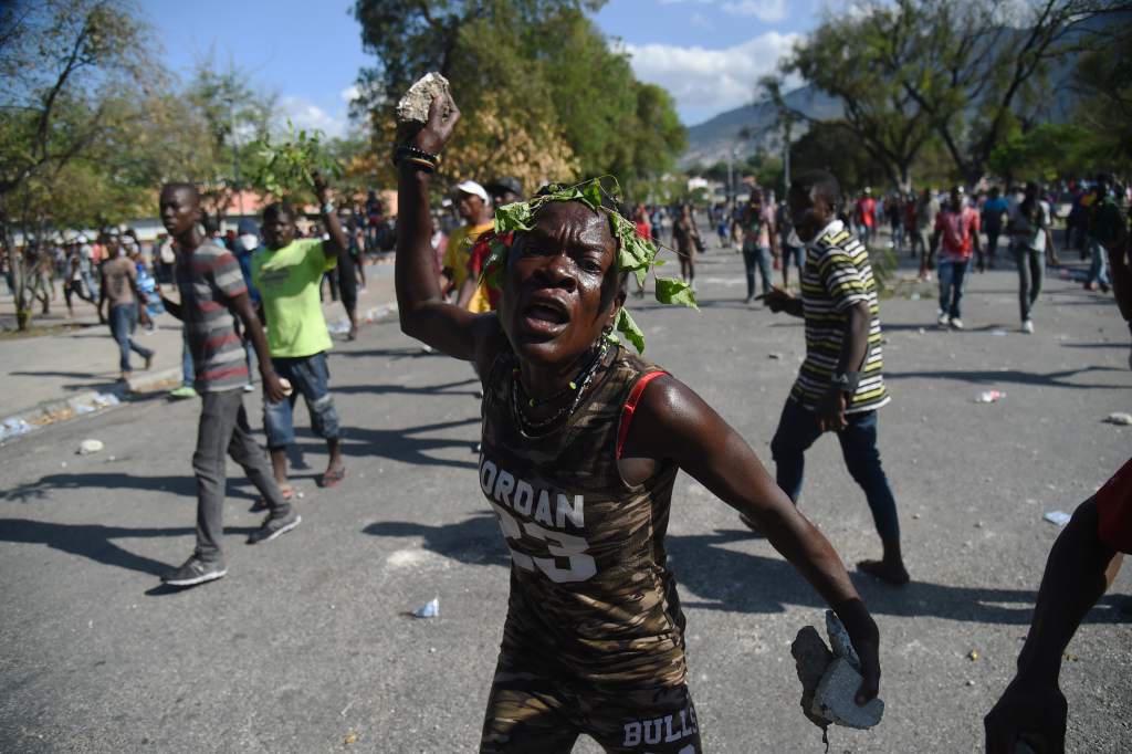 Foto: Hector Retamal/AFP/Getty Images. Tomada de CNN - In pictures: Unrest in Haiti (February 21, 2019) (https://edition.cnn.com/2019/02/21/americas/gallery/haiti-unrest/index.html)