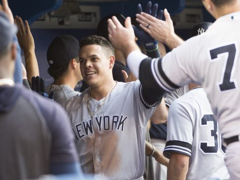 Aug 8, 2019; Toronto, Ontario, CAN; New York Yankees third baseman Gio Urshela (29) celebrates in the dugout after hitting a two run home run during the third inning against the Toronto Blue at Rogers Centre. Mandatory Credit: Nick Turchiaro-USA TODAY Sports