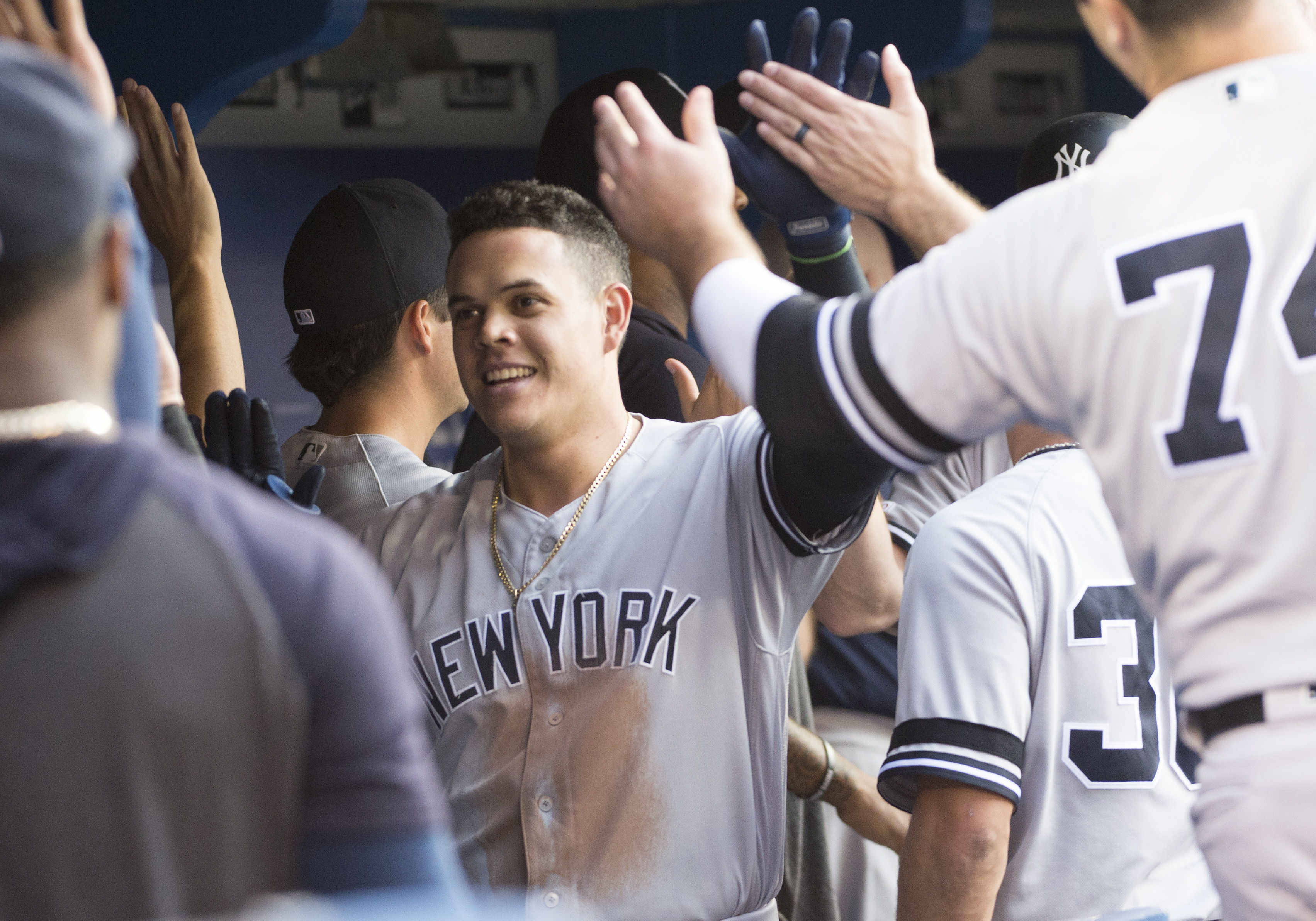 Aug 8, 2019; Toronto, Ontario, CAN; New York Yankees third baseman Gio Urshela (29) celebrates in the dugout after hitting a two run home run during the third inning against the Toronto Blue at Rogers Centre. Mandatory Credit: Nick Turchiaro-USA TODAY Sports