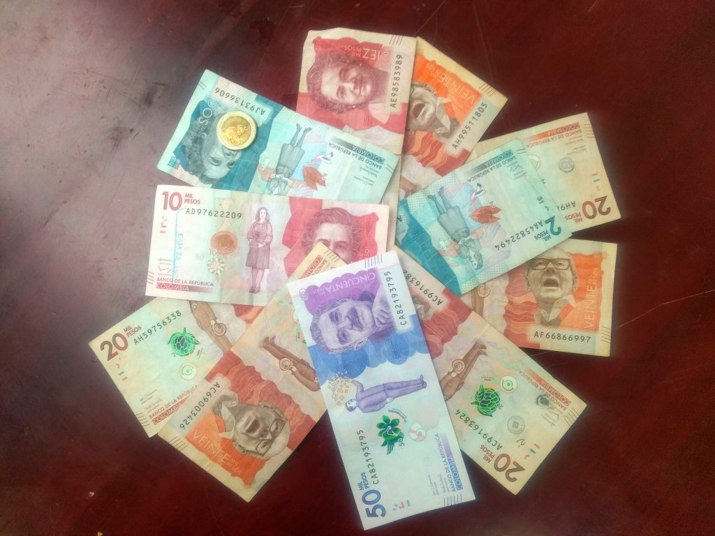 Some dirty Colombian cash. Watch out for the fake notes ...