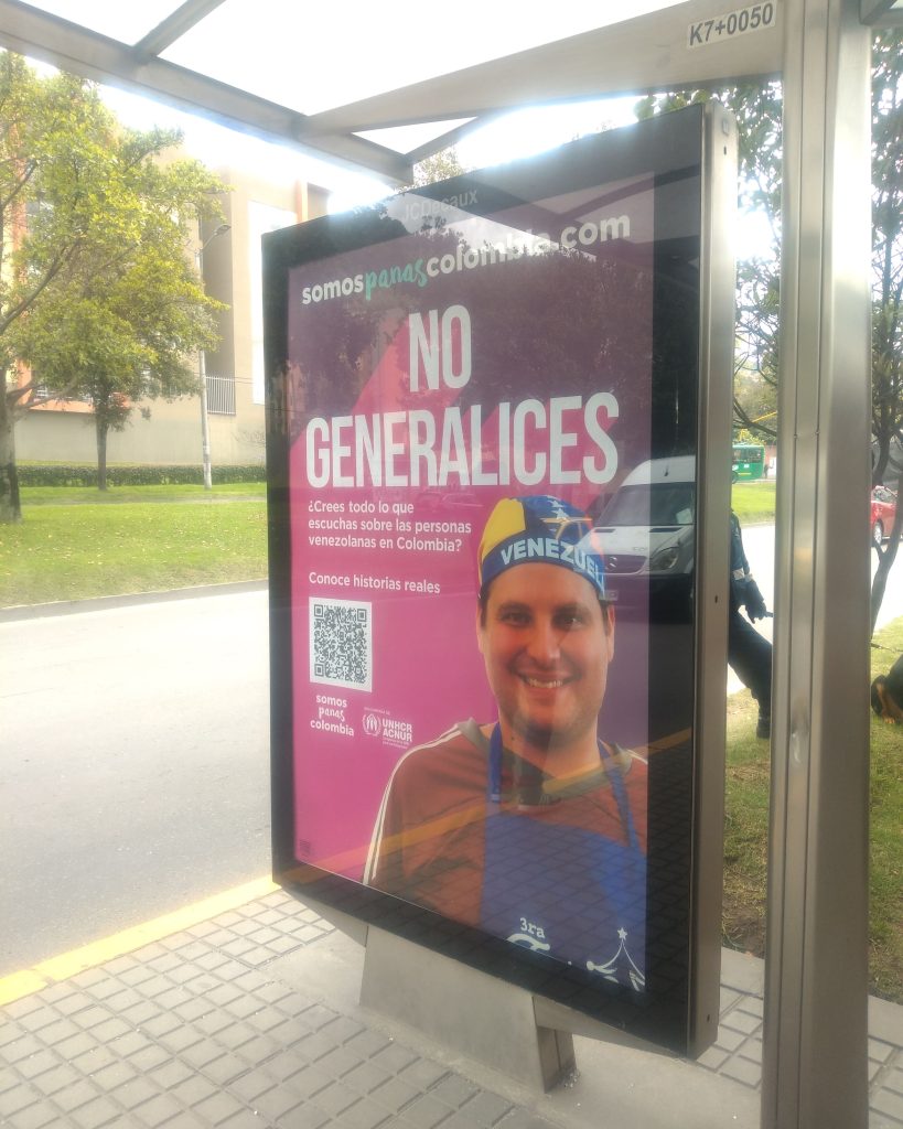 A bus shelter ad in Bogotá, Colombia asks locals not to make negative generalisations against Venezuelans.