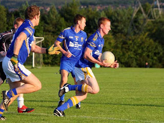 Wrong Way Corrigan playing Gaelic football with Belfast's Naomh Bríd in 2010.